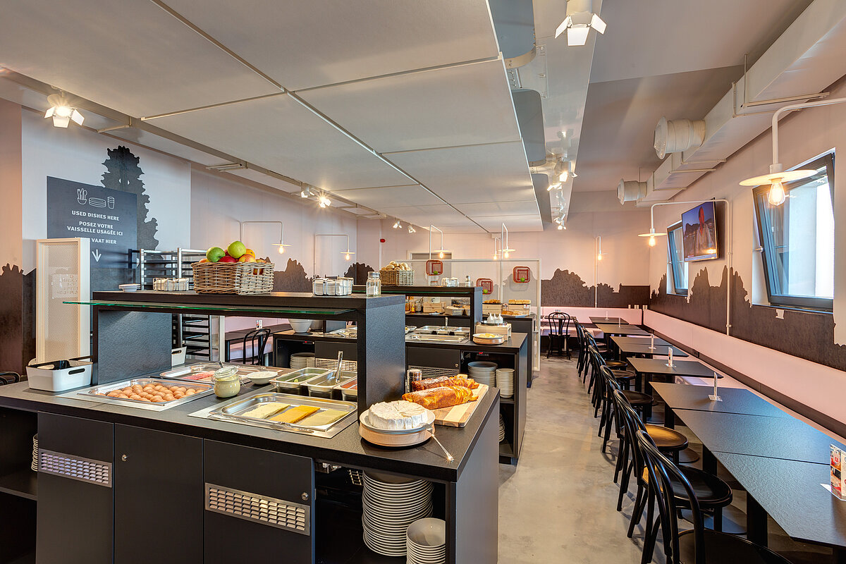 Salle de petit déjeuner MEININGER Hotel Bruxelles Gare du Midi