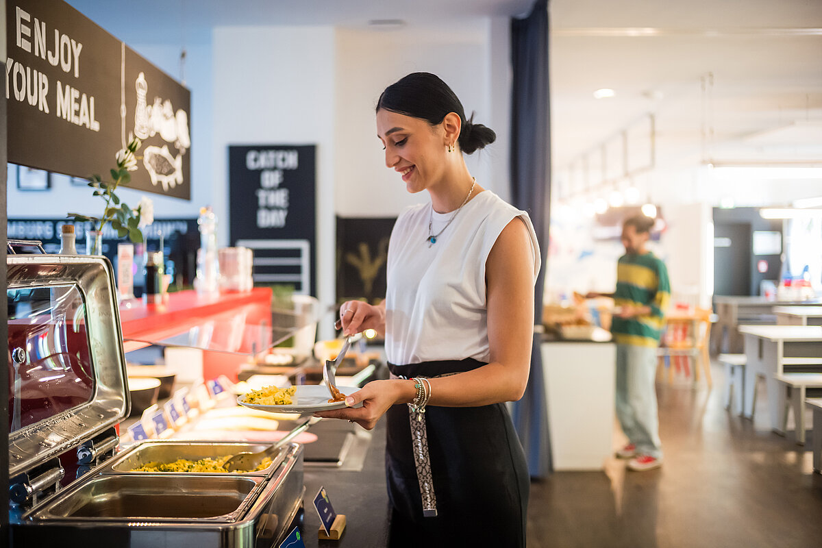 Sala de desayuno MEININGER Hotel Hamburg City Center