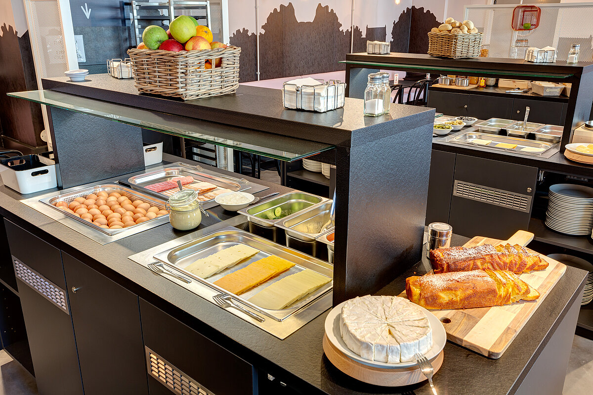 Salle de petit déjeuner MEININGER Hotel Bruxelles Gare du Midi