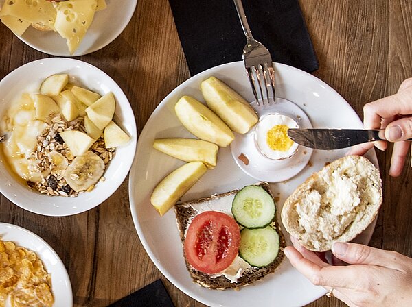 Eating breakfast at MEININGER Hotels