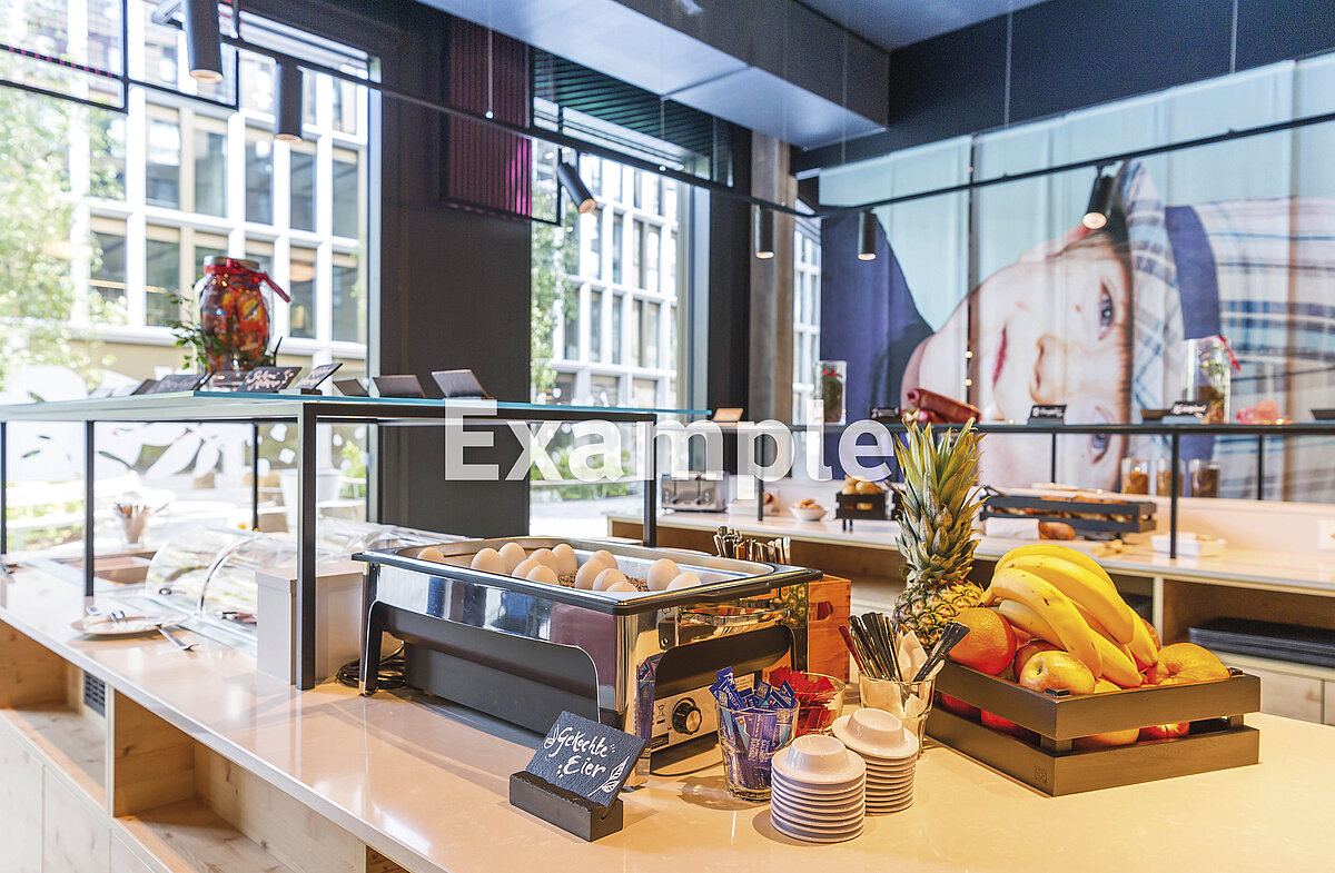 Salle de petit déjeuner MEININGER Hotel Barcelona Fira Gran Via