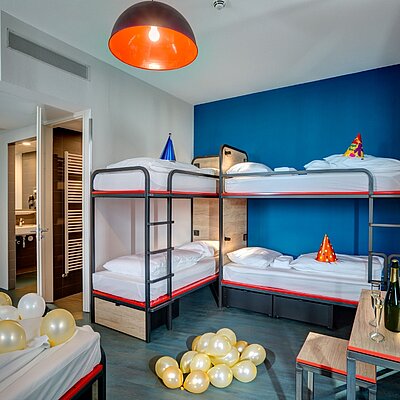 MEININGER Hotels multi-bed room for stag parties, perfect for group celebrations.